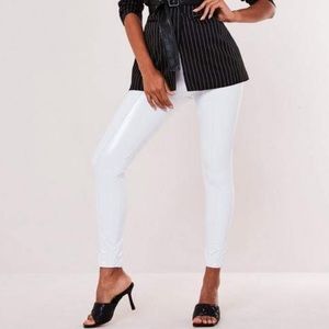 White vinyl legging with seam detail. Never worn